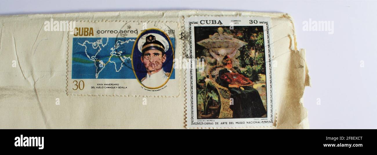 Stamps of Cuba shows Anniversary of first flight CAMAGUEY Seville. Austrian-Cuban pilot Antonio Menendez & National museum works of art in the garden Stock Photo