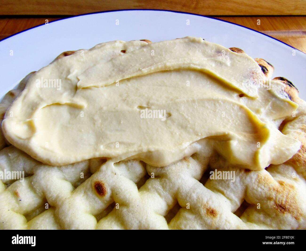 Gourmet Hummus with Tahini on Pitta Bread Stock Photo
