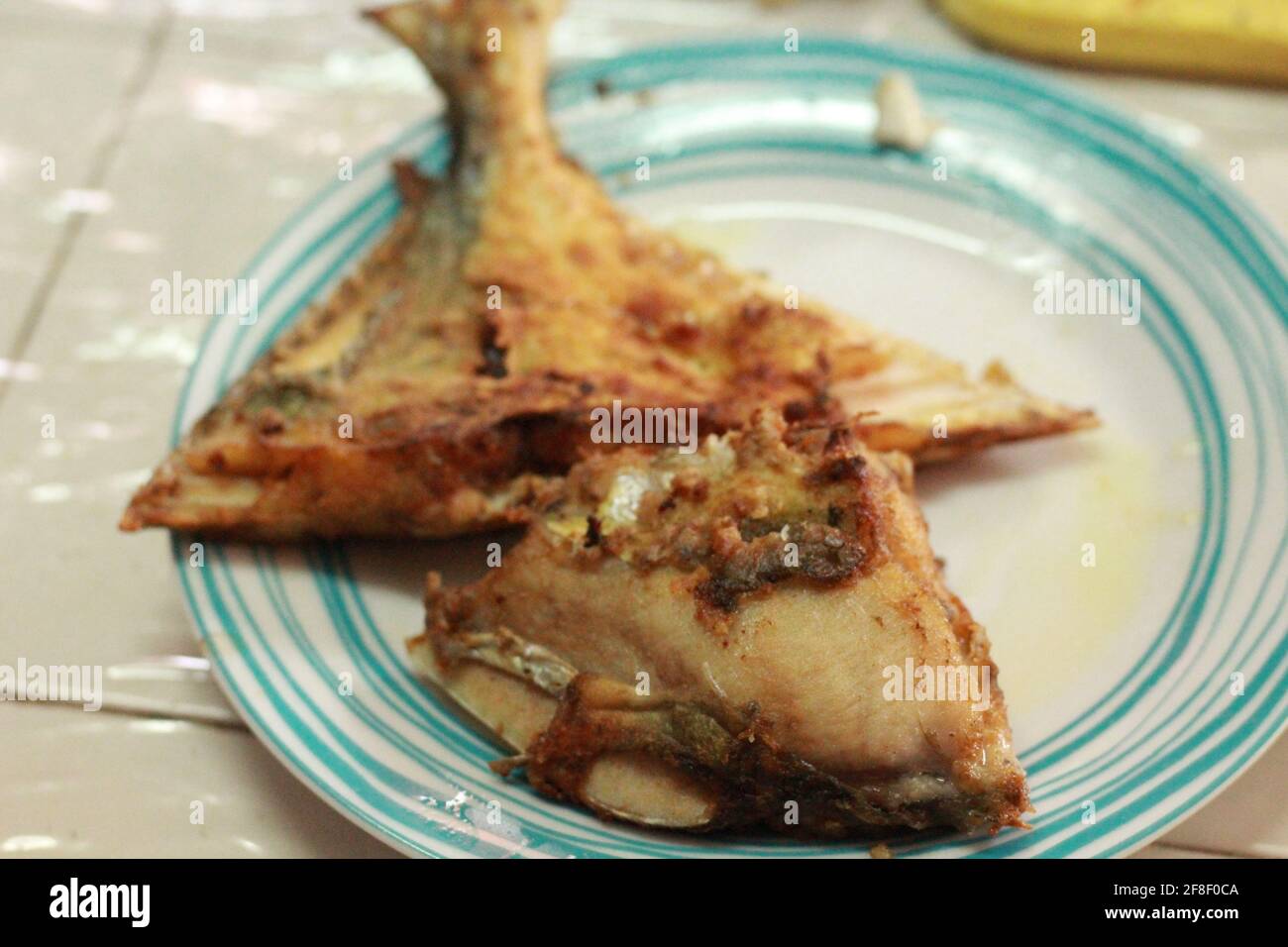 A plate of fried fish Stock Photo Alamy