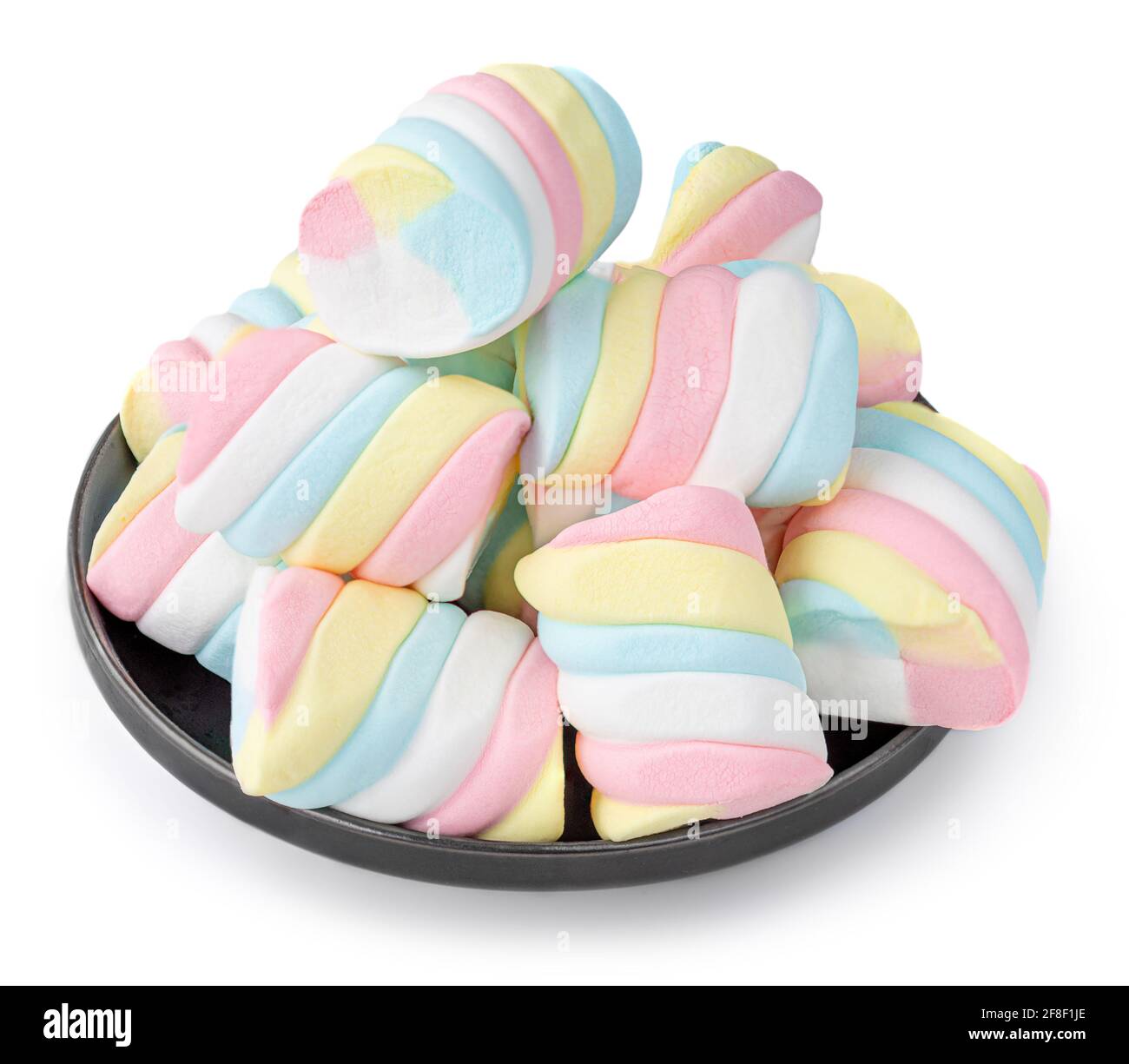 Marshmallow candies on a plate isolated on white background. Huge, big