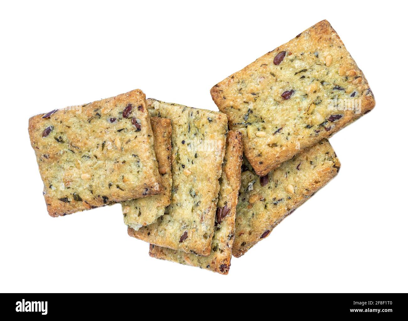 Dry crackers isolated on white background. Cracker cookies with herbs top view Stock Photo