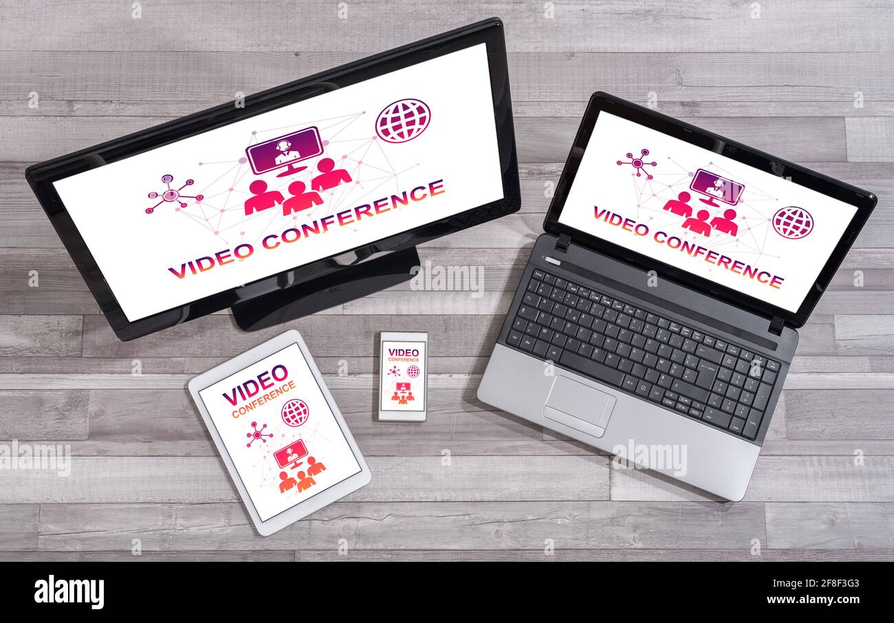 Video conference concept shown on different information technology devices Stock Photo