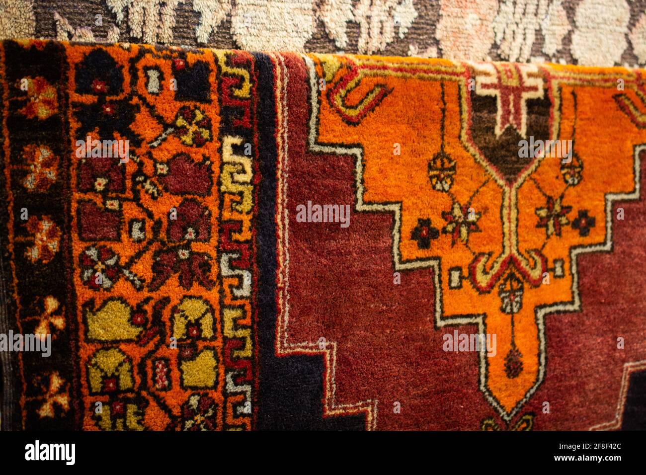 Traditional Turkish rug textile with patterns in bazaar Stock Photo Alamy
