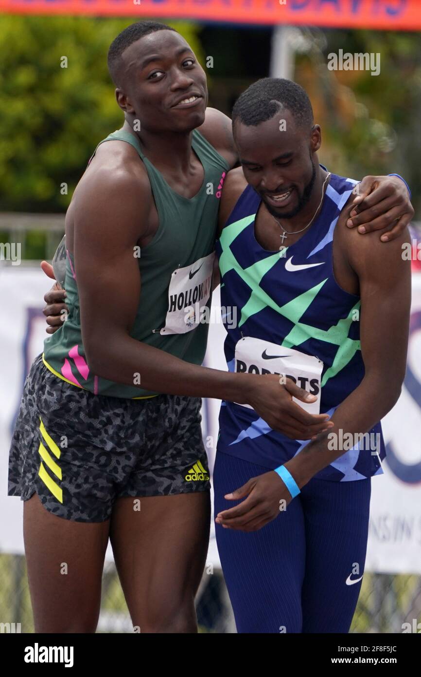 Grant Holloway (USA), left, and Daniel Roberts (USA) embrace after placing first and second in the 110m hurdles during the Miramar Invitational, Satur Stock Photo