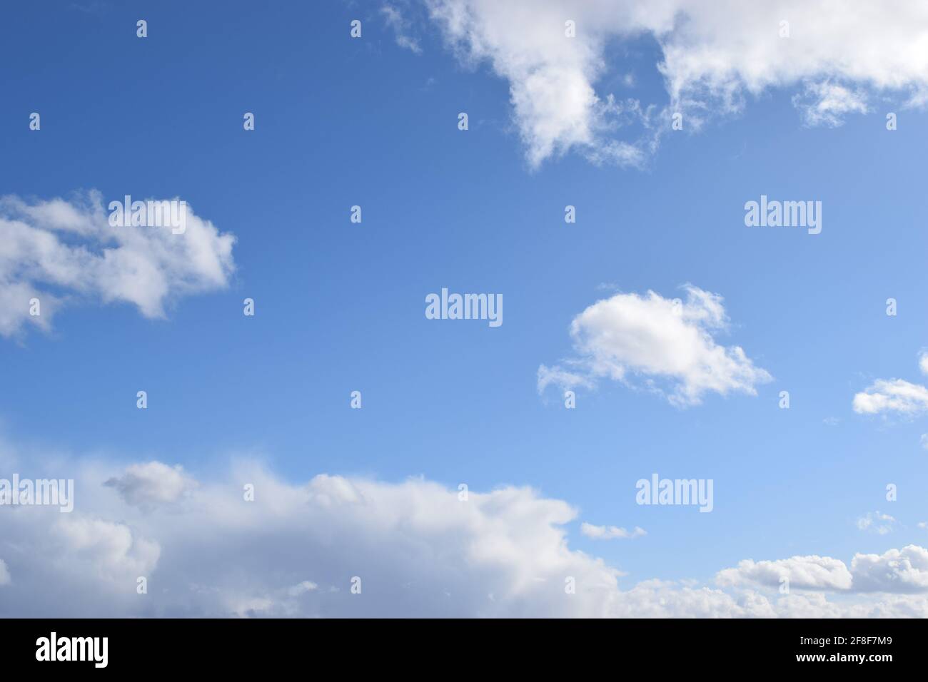 Beautiful view of white fluffy clouds on a blue sky - perfect for ...