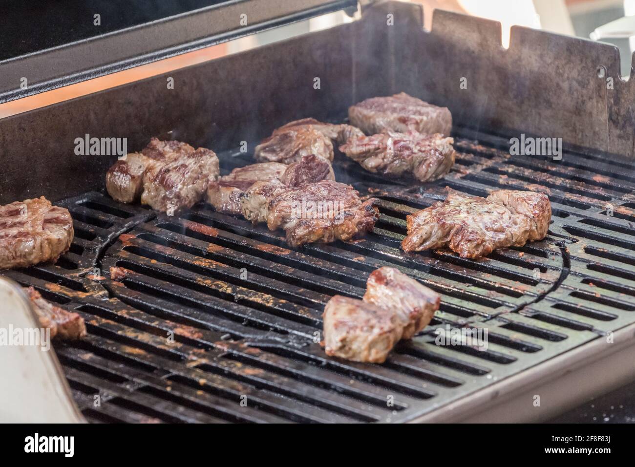 Barbecue grill gourmet entrecote fillet steaks at summer party. Delicious  BBQ from beef pork turkey or chicken meat. Perfectly grilled for dinner  Stock Photo - Alamy