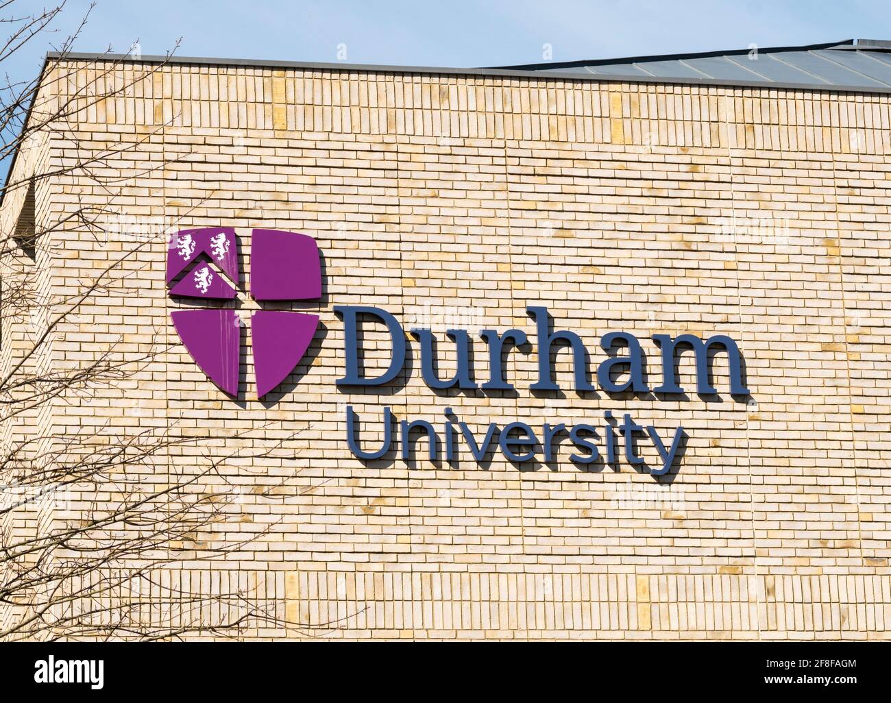 The logo of Durham University on a building within the Durham city campus, England, UK Stock Photo
