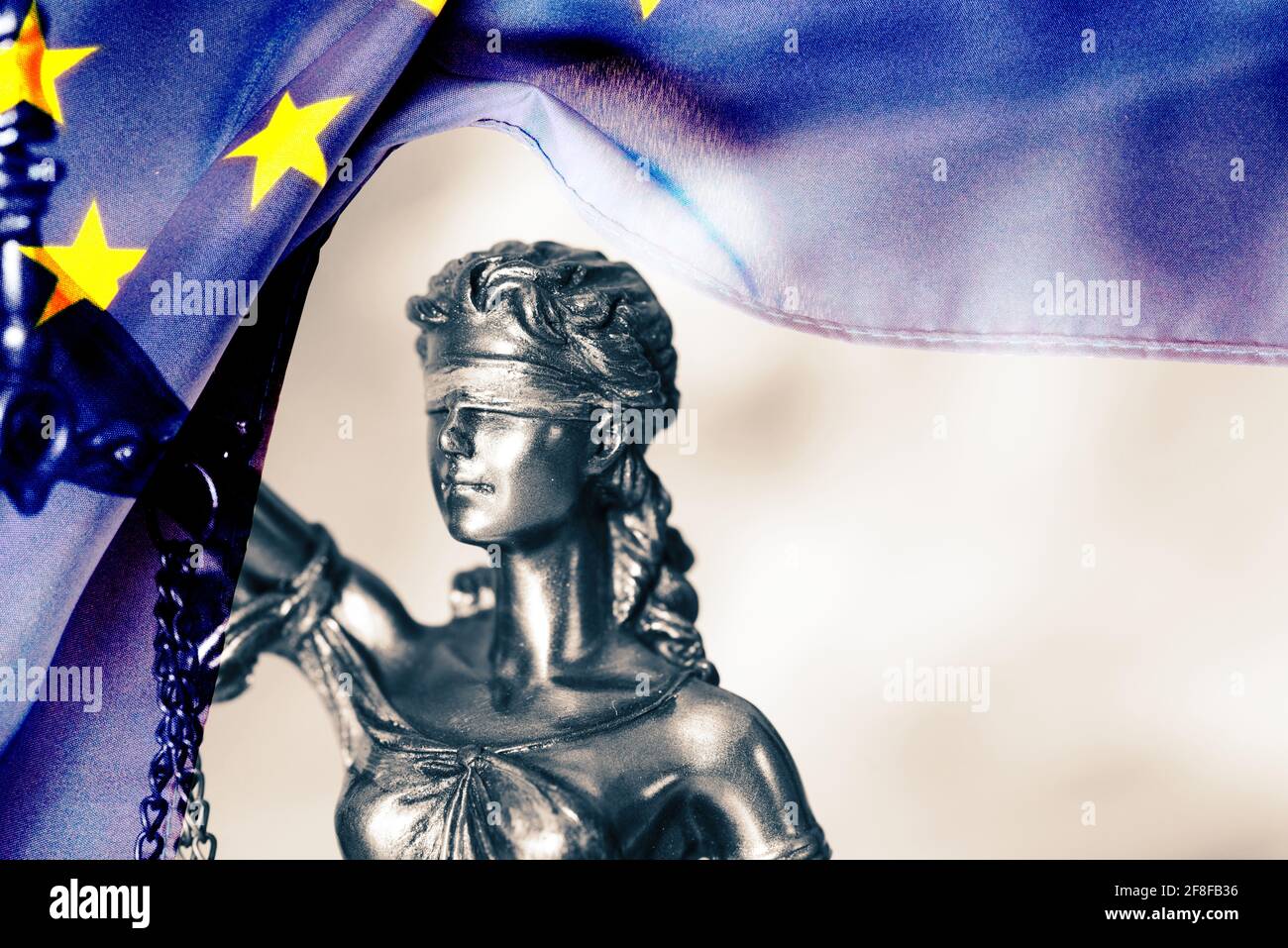 Figure of Justitia and flag of the European Union EU Stock Photo