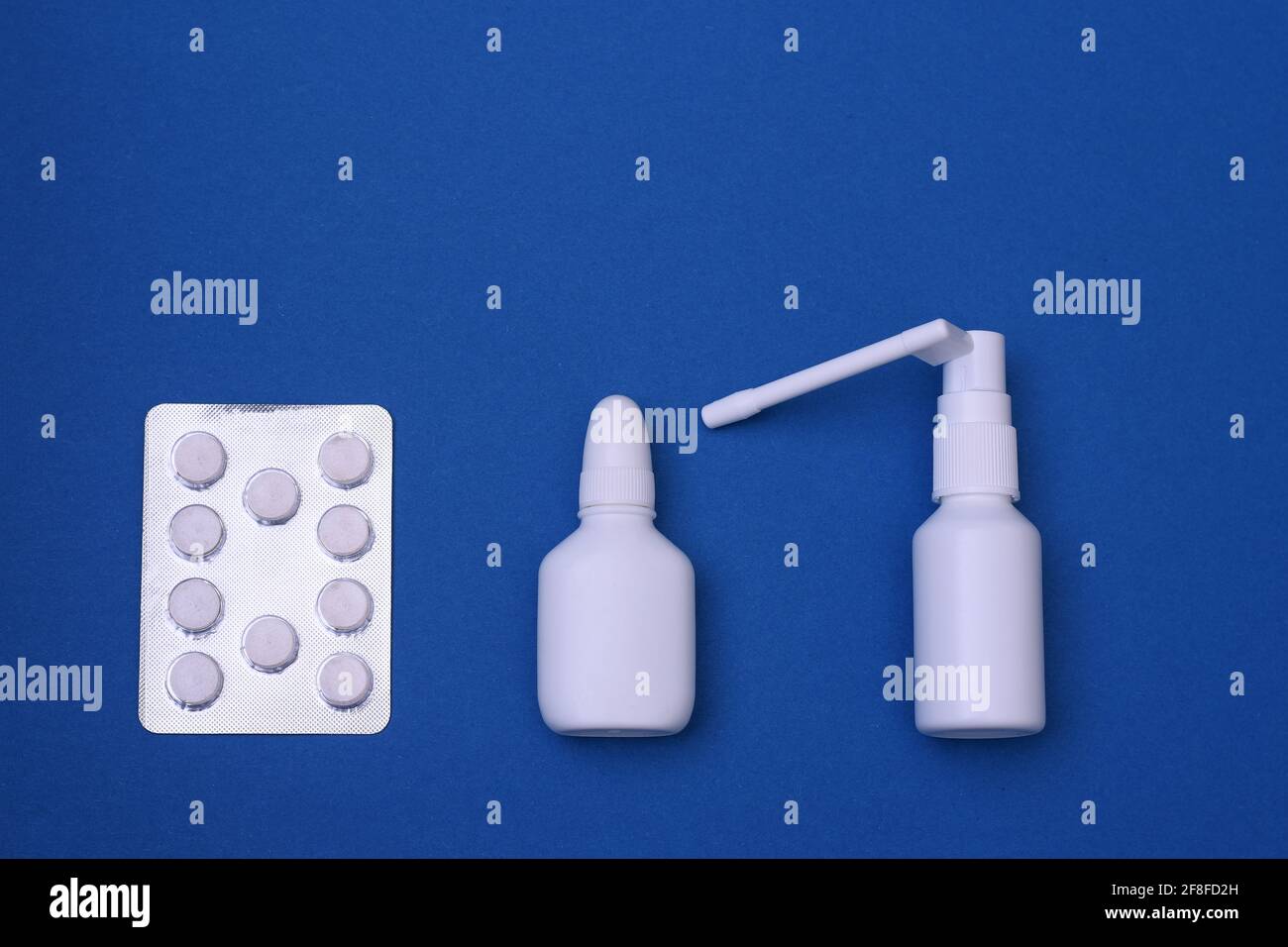 Medicines for the treatment of influenza and the virus. Throat spray, nose spray, pills. mock up Stock Photo