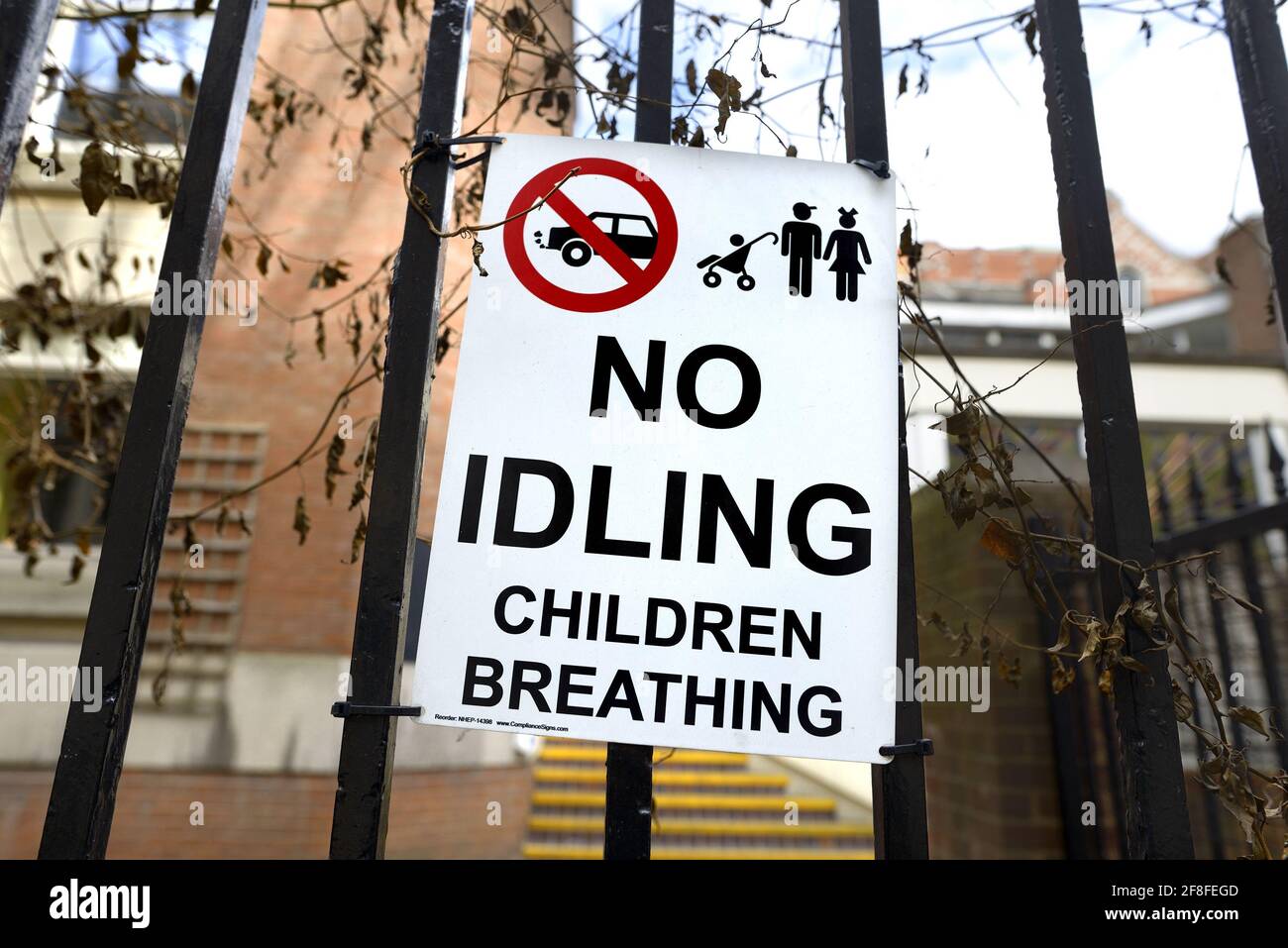London, England, UK. "No Idling - Children Breathing" sign outside Westminster Cathedral Primary School Stock Photo