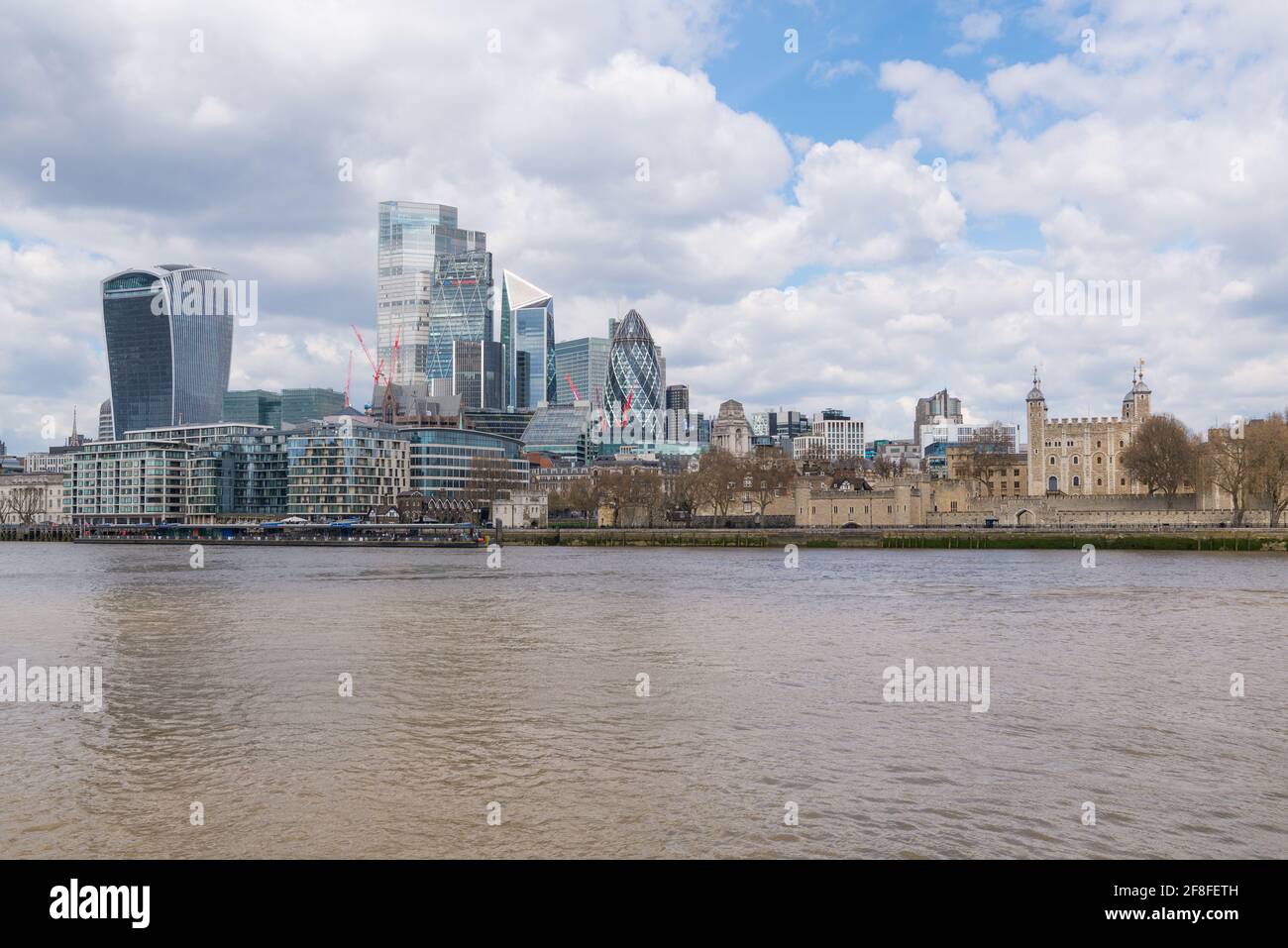 City of London skyline with modern skyscraper buildings as seen from the south side of the Thames and including the historic Tower of London. Stock Photo