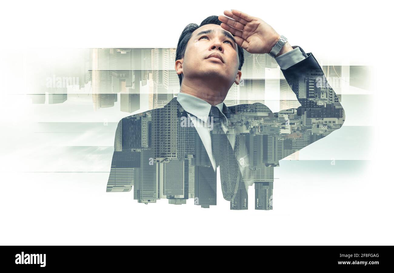 Double exposure - Business leader vision for success, looking away with modern buildings in city background. Concept of talented leadership. Stock Photo
