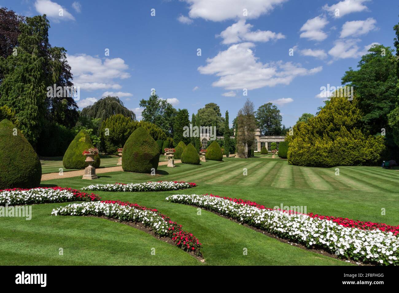 Castle Ashby Gardens in summer with colourful flower beds in the