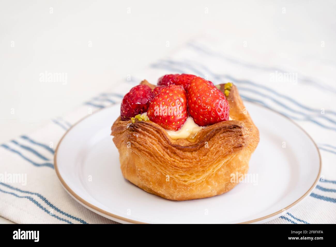 Danish bread with strawberry and custard cream Stock Photo Alamy