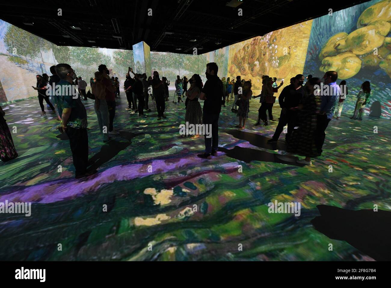 Miami, FL, USA. 13th Apr, 2021. People attend the Beyond Van Gogh exhibit, Beyond Van Gogh is a rich and unique multimedia experience, taking the viewer on a journey through over 300 iconic artworks held at the Ice Palace on April 13, 2021 in Miami Florida. Credit: Mpi04/Media Punch/Alamy Live News Stock Photo