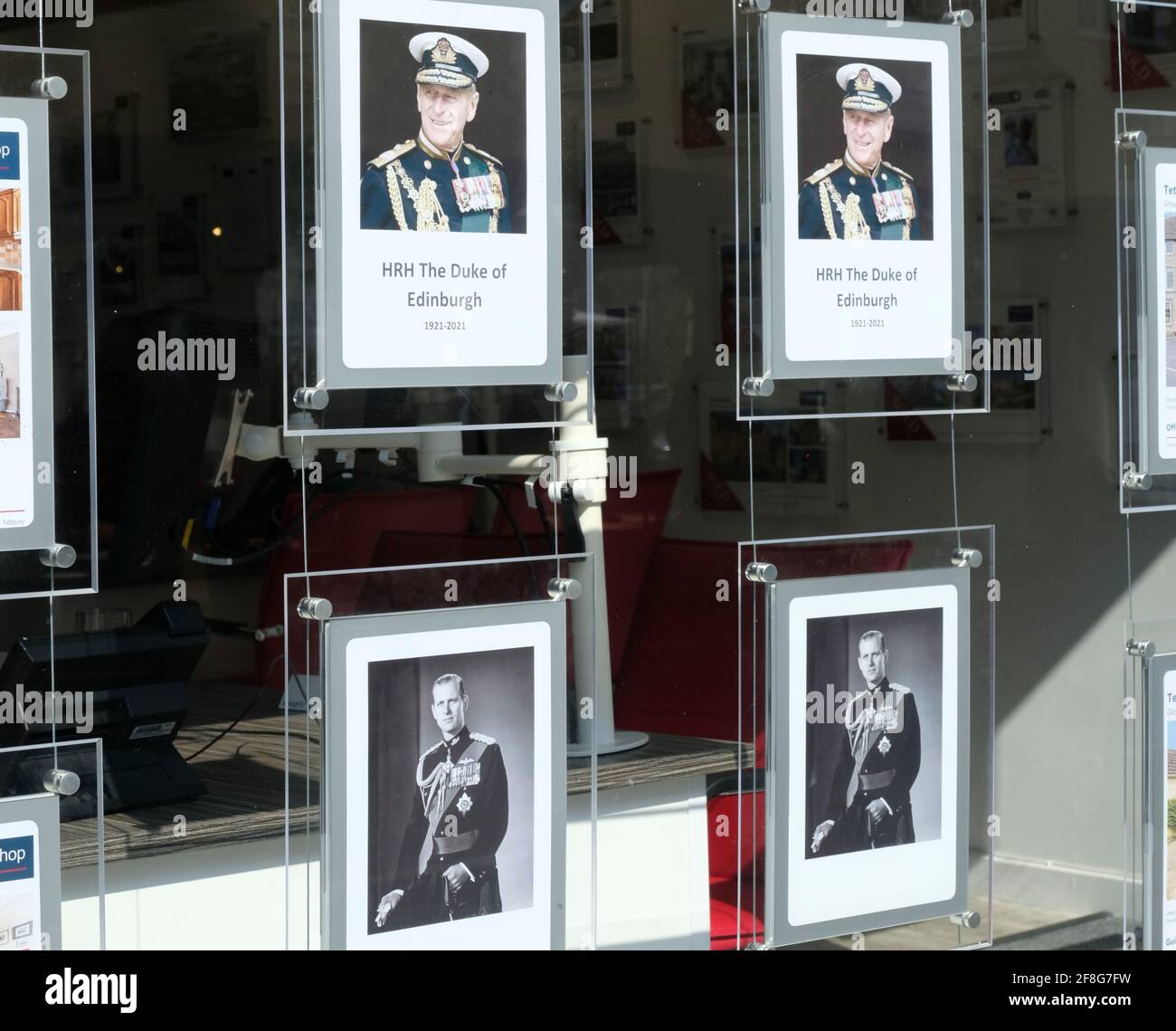 Tetbury, Gloucestershire;, UK. 14th Apr, 2021. Local shops show their respect for the late Duke of Edinburgh, Prince Phillip. Tetbury has many links with the royal family, Prince Charles has a home at Highgrove House and Princess Anne at Gatcombe Park just a few miles away. Credit: JMF News/Alamy Live News Stock Photo
