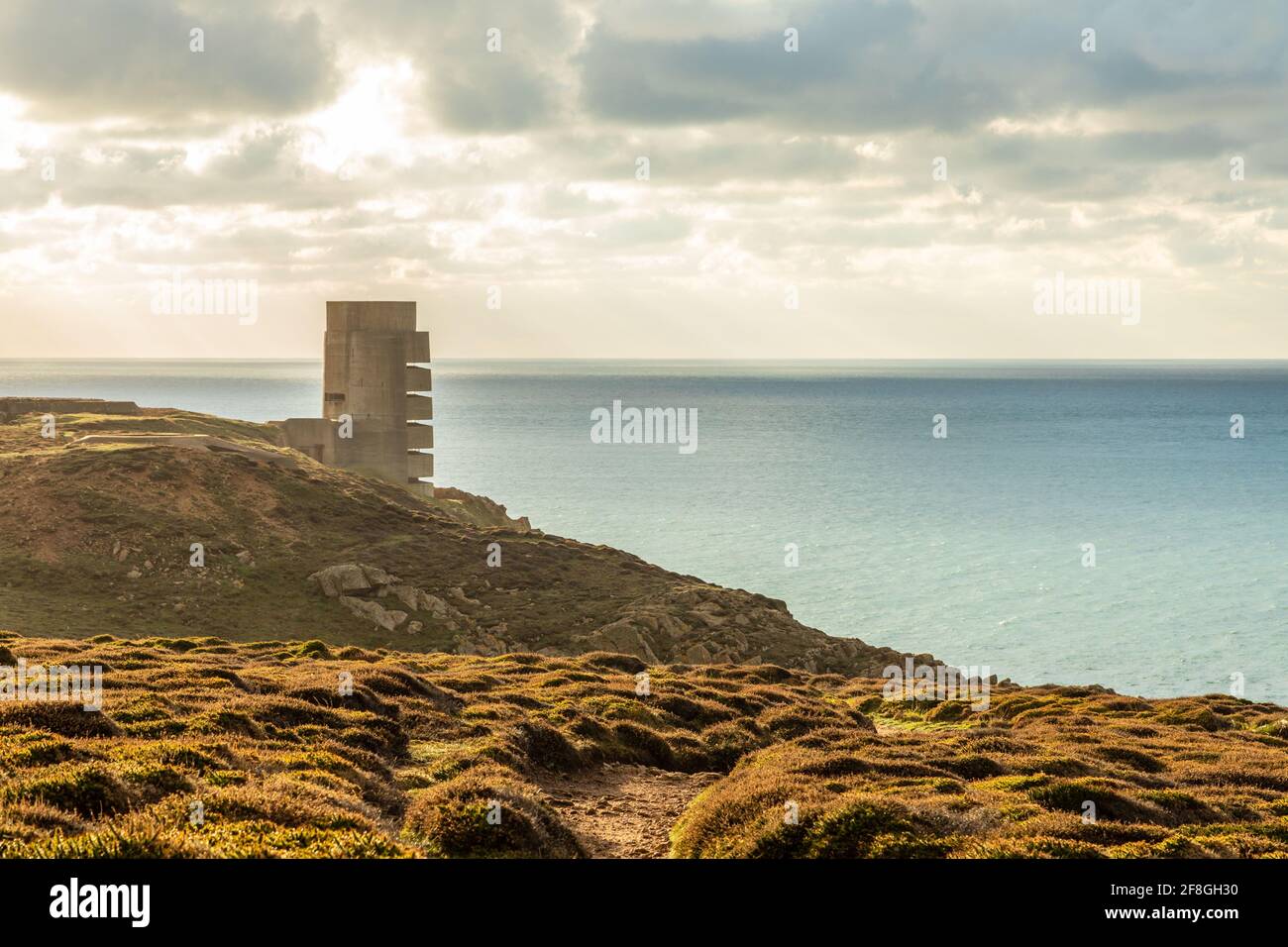 WWII concrete nazi naval tower on the seashore, Saint Quen, bailiwick of Jersey, Channel Islands Stock Photo