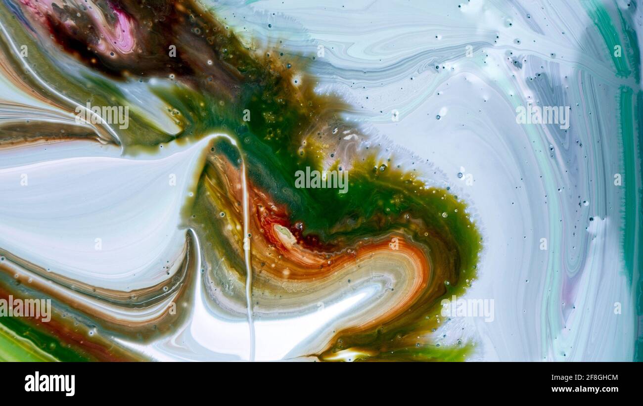 The colors of the aqueous ink are translucent. Abstract multicolored marble texture background Stock Photo