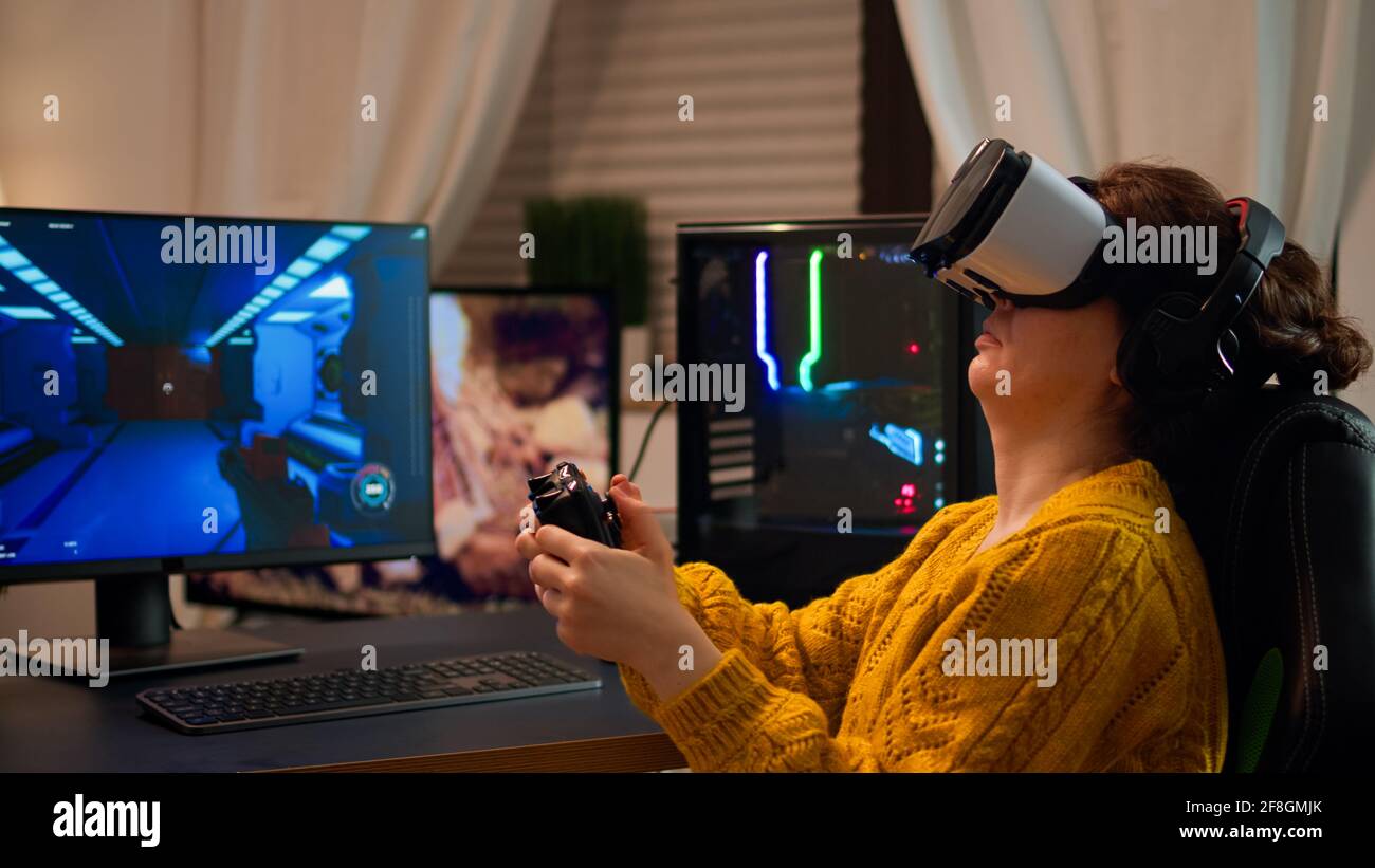 Professional pro gamer playing space shooter video game new graphics on  powerful computer from home. Virtual shooter game in cyberspace, esports  player performing on pc gaming tournament Stock Photo - Alamy