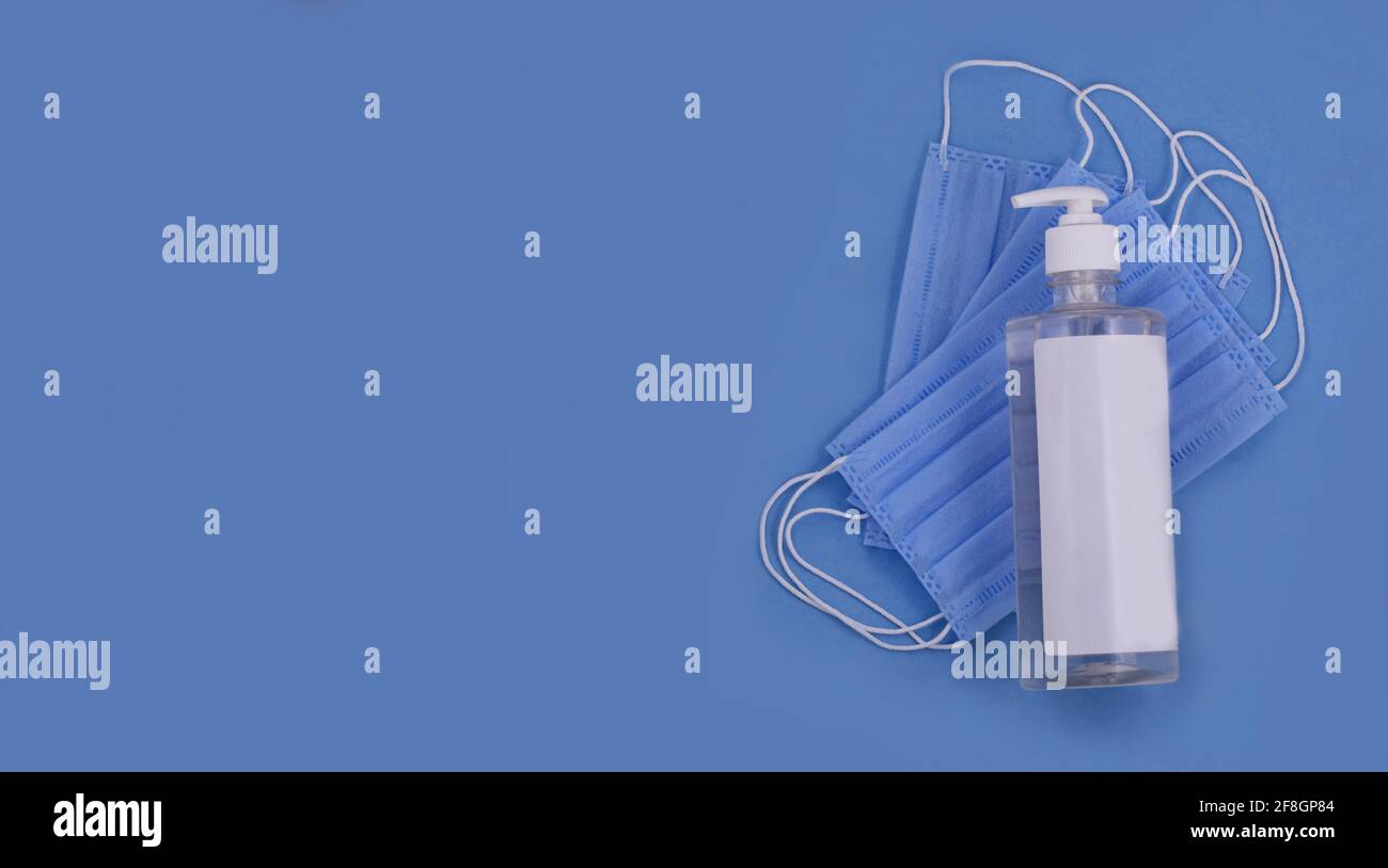 Coronavirus corona virus prevention travel surgical masks and hand sanitizer gel for hand hygiene spread protection corona virus protection , Stock Photo