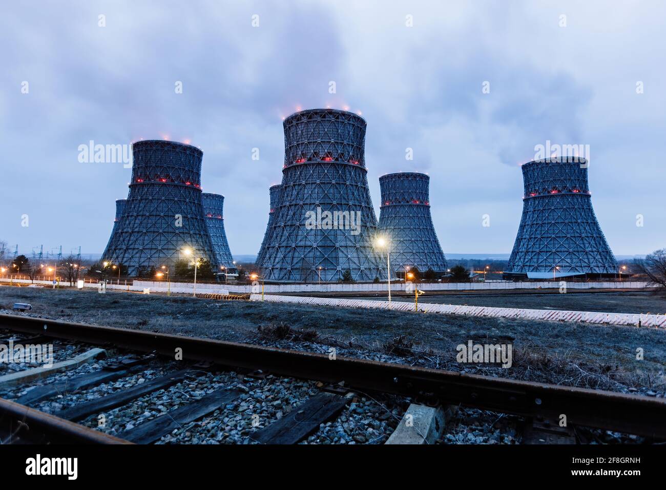 Cooling tower of nuclear power plant at night Stock Photo - Alamy