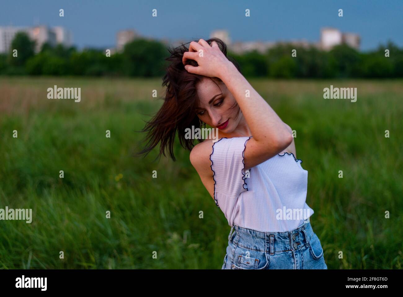 portrait of a beautiful red-haired girl sunset Stock Photo