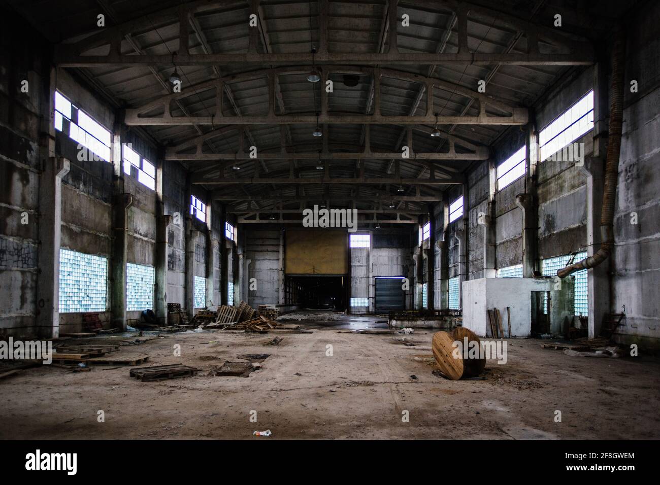 Old abandoned large industrial hall. Empty warehouse Stock Photo Alamy