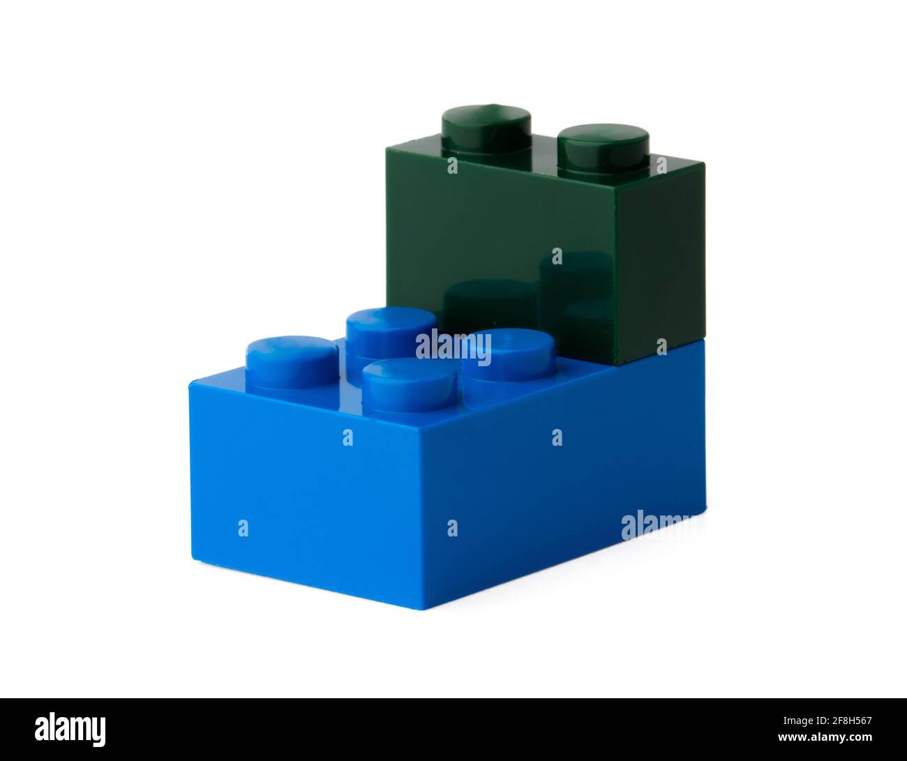 Colorful plastic toy building blocks isolated on white Stock Photo - Alamy