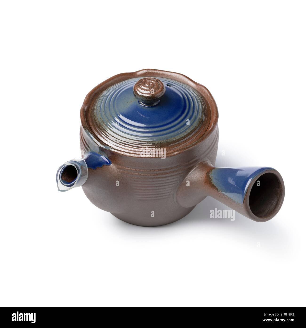 Single ceramic Japanese teapot isolated on white background Stock Photo