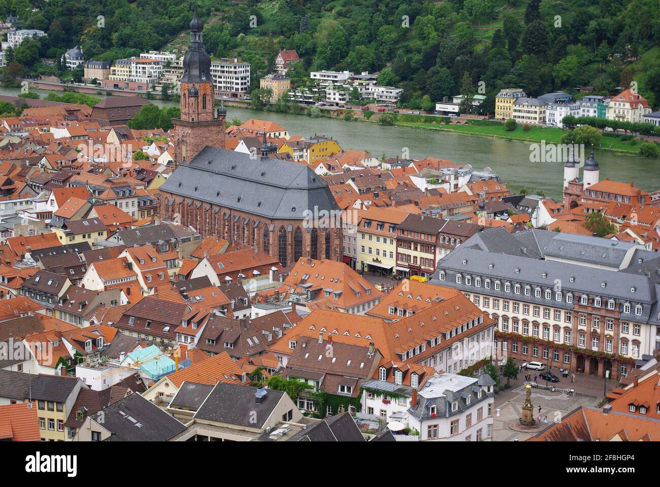 Aerial view including Church of the Holy Spirit and the old bridge gate’s twin towers taken from the castle, Heidelberg, Baden-Württemberg, Germany Stock Photo