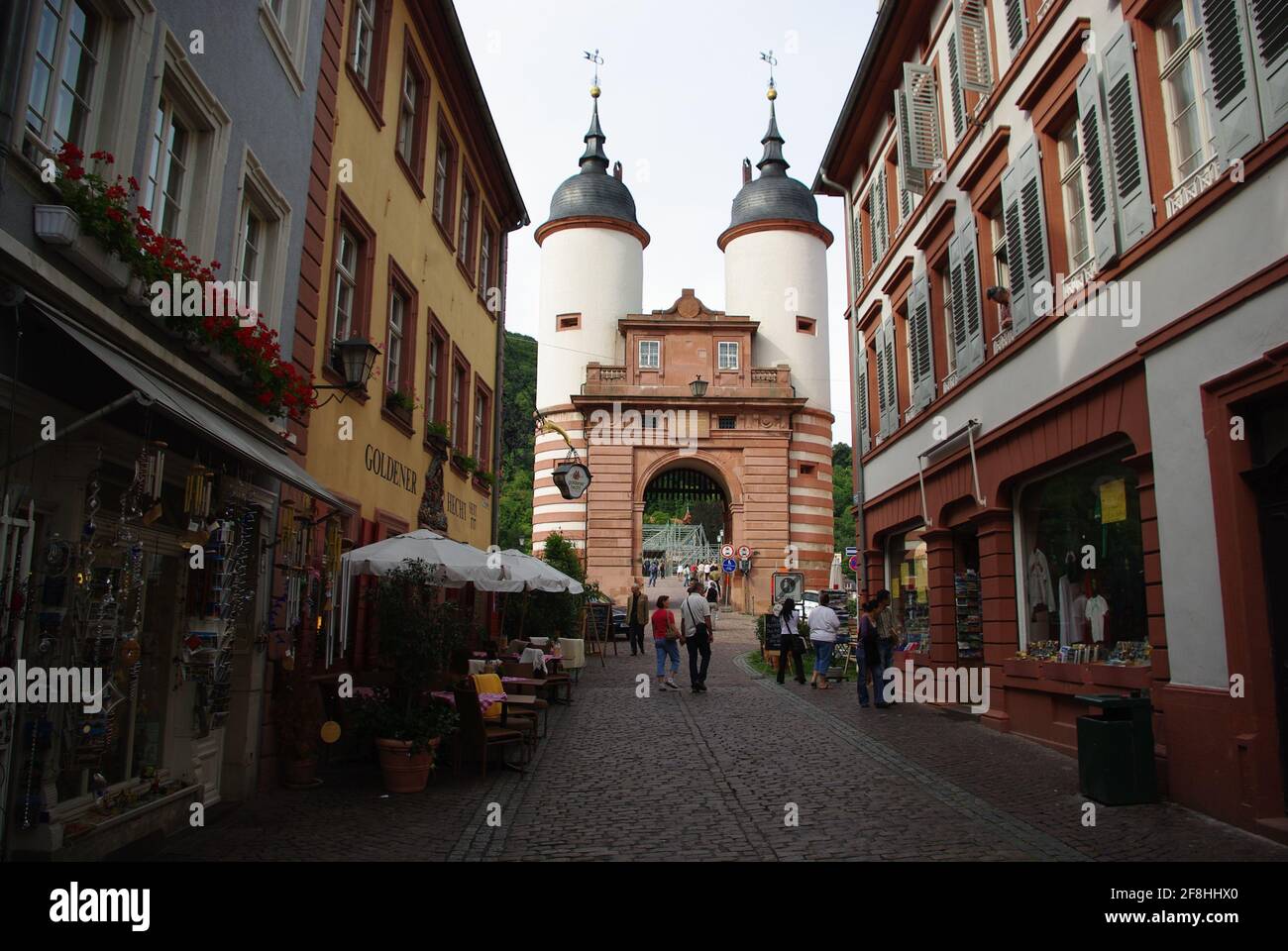Street scene with old bridge gate, Heidelberg, Baden-Württemberg, Germany Stock Photo