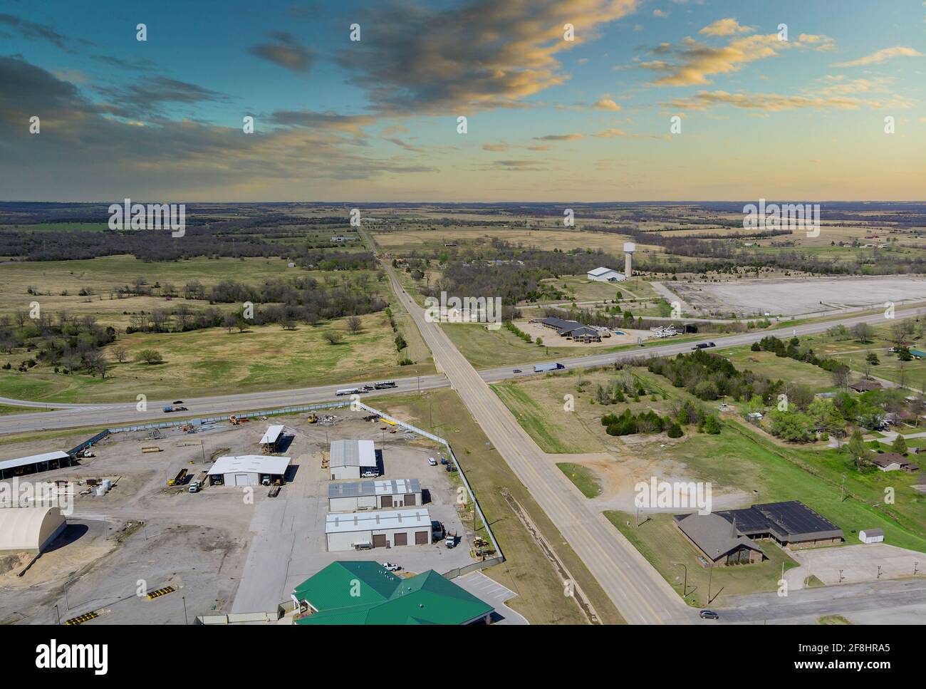 The residential quarters of sunset dawn over the village near the forest with a beautiful town
