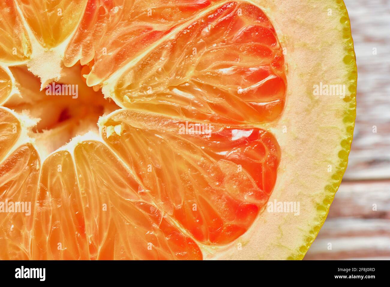 Red pomelo closeup, tropical fruit, healthy eating concept, background