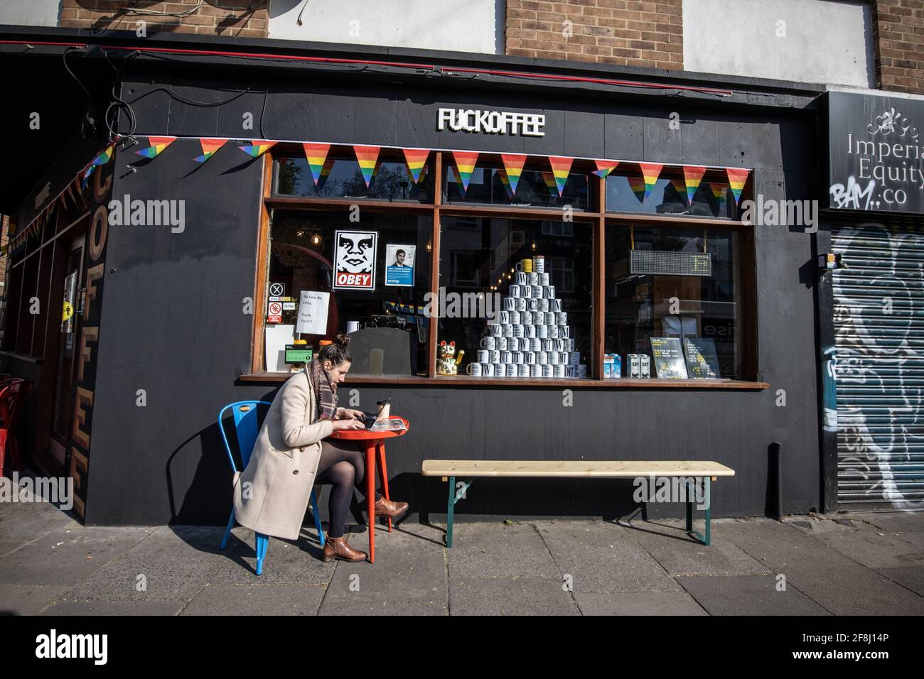 'FUCKOFFEE' coffee shop on Bethnal Green Road, East London, England, United Kingdom Stock Photo