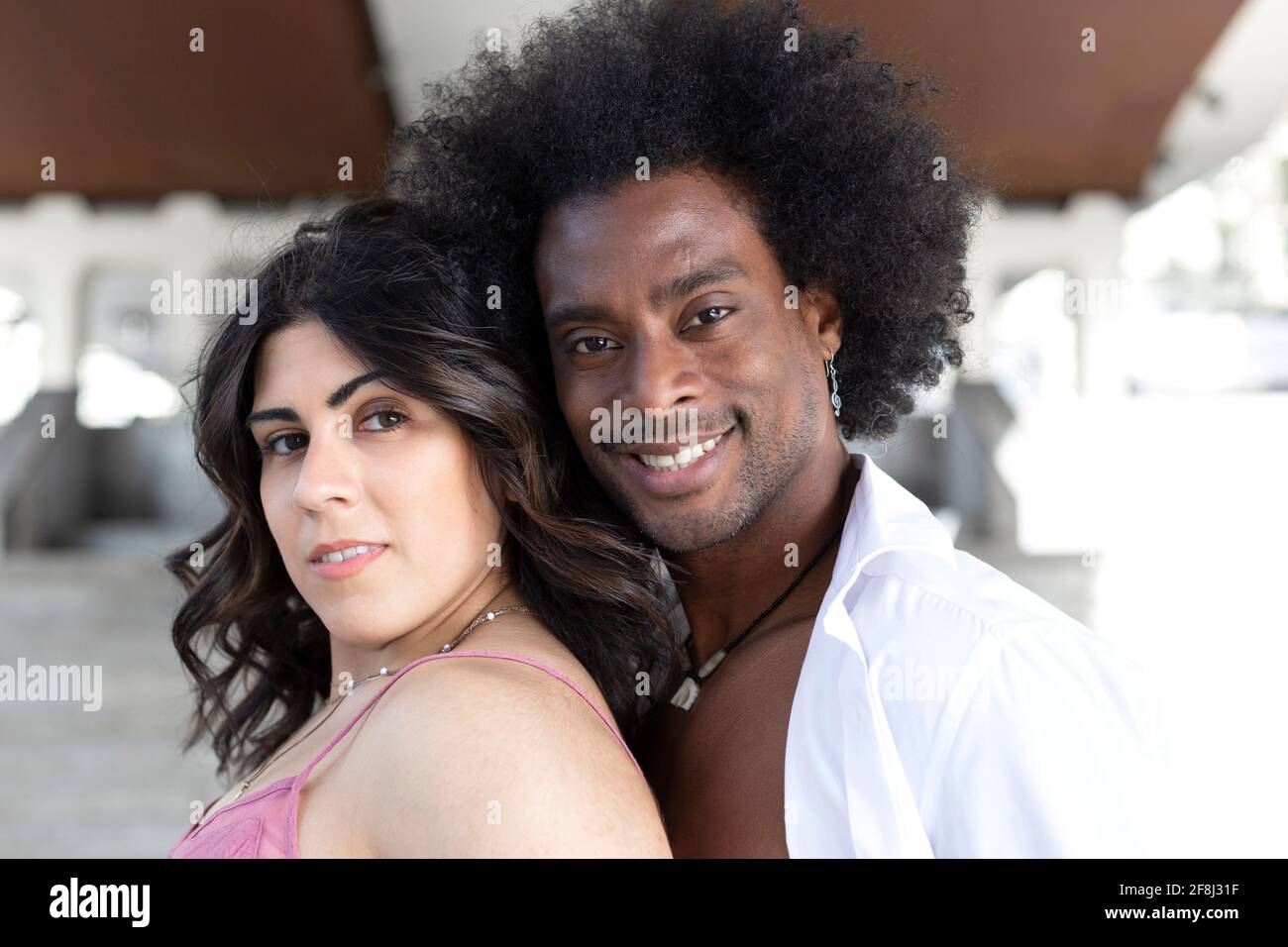 Close up portrait of black man and caucasian woman. Concept of multiethnic couple. Stock Photo