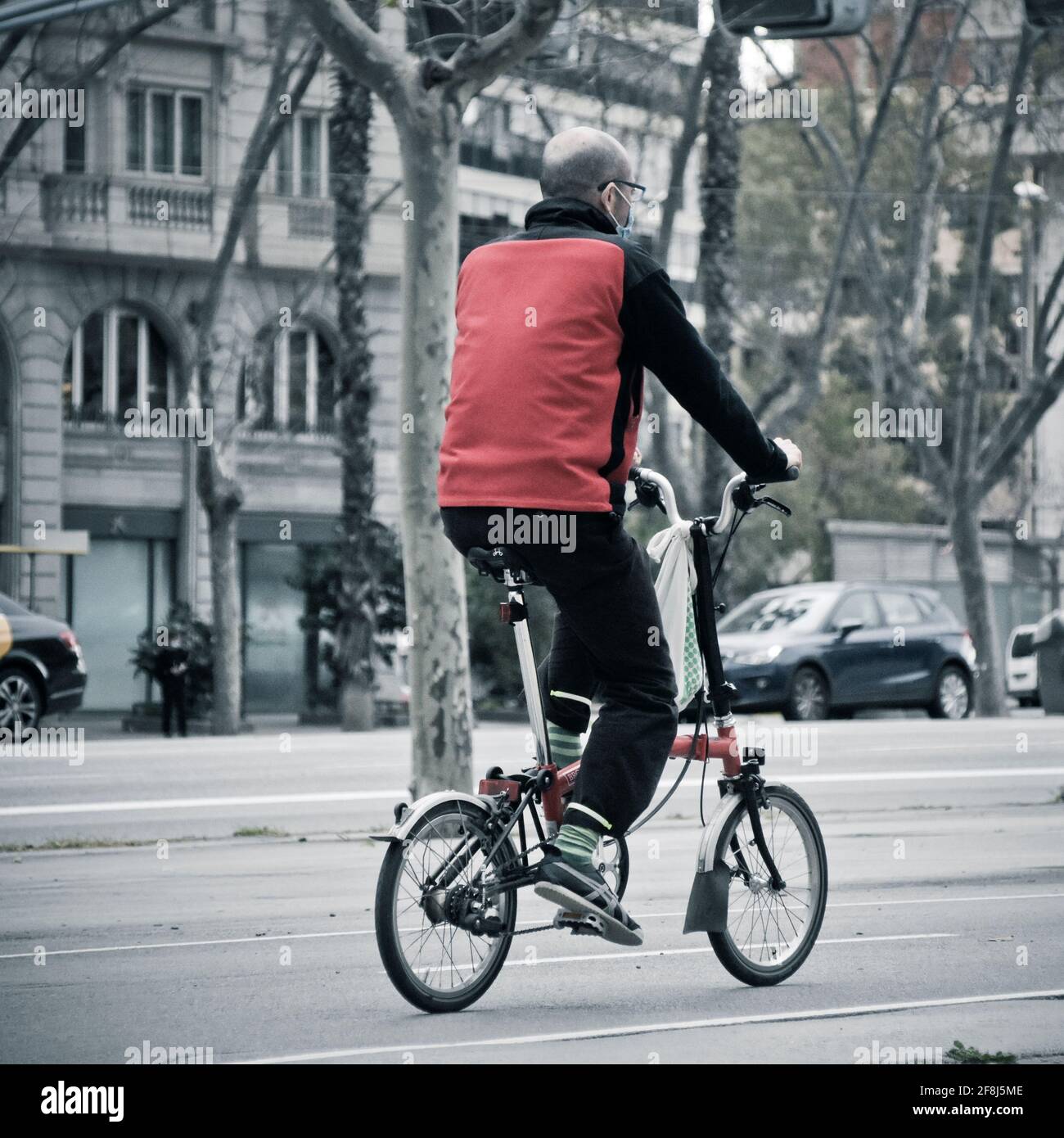 Business man riding a bike hi-res stock photography and images - Alamy