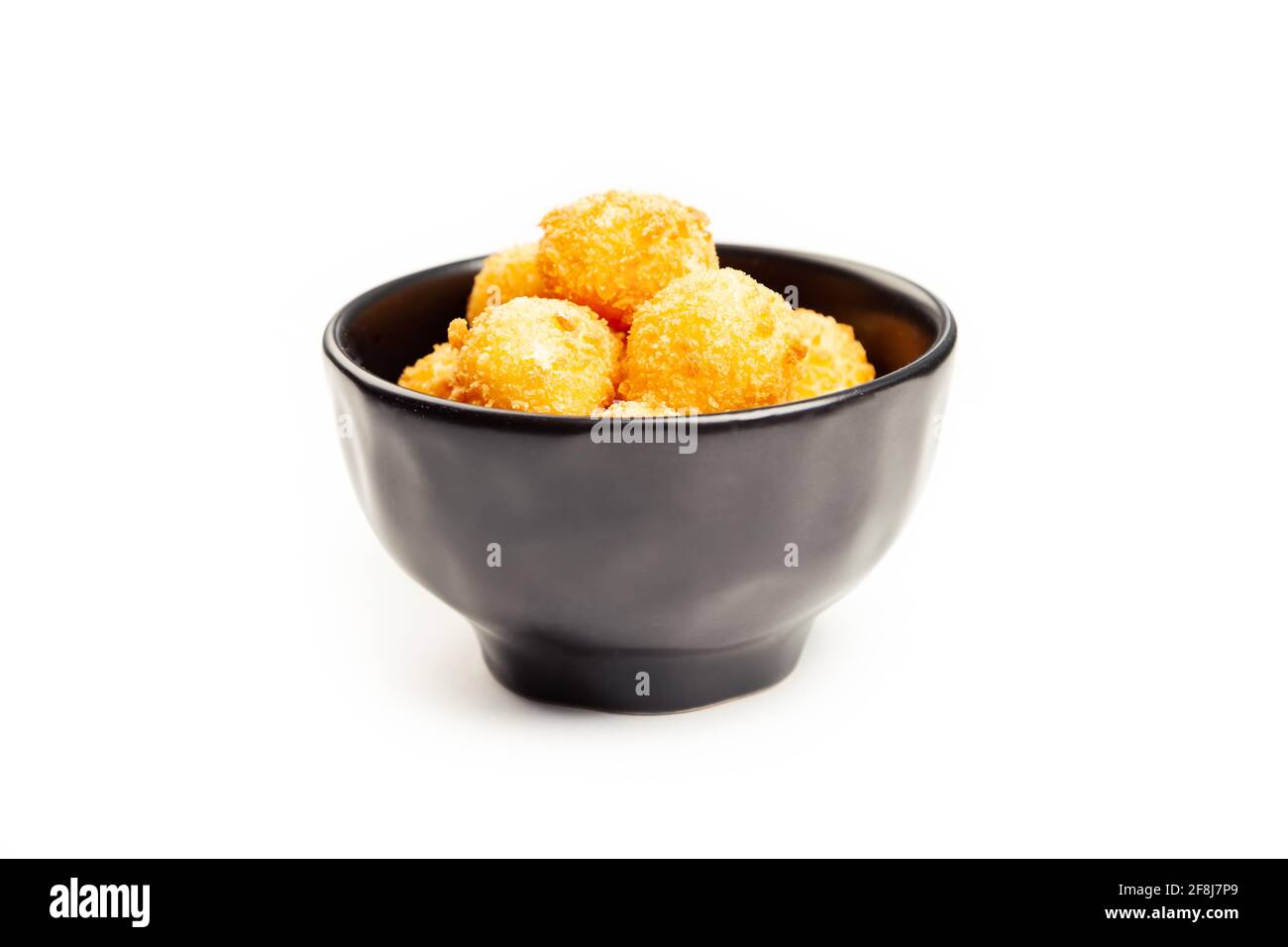 Cheese Ball Bonanza Powdery orange salty snack goodness. Yummy snack. Junk  food. Treat. Delicious background. Throwback food. Stock Photo