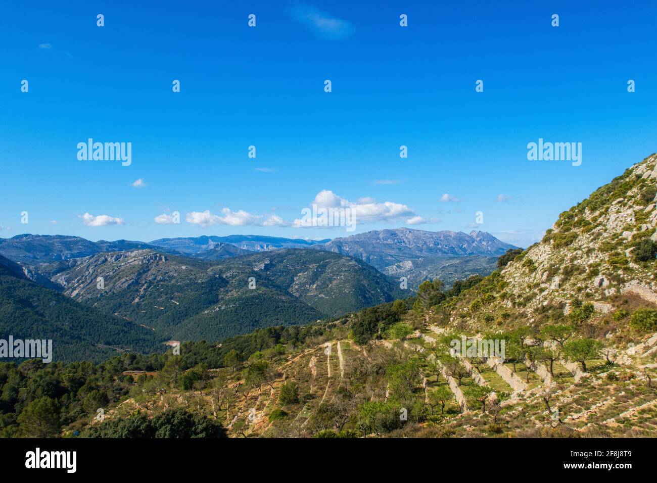 Green mountains and beautiful sky clouds under the blue sky Stock Photo ...