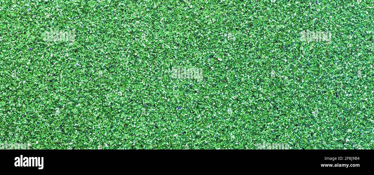 background of GREEN glitter panel all shiny and shimmering Stock Photo