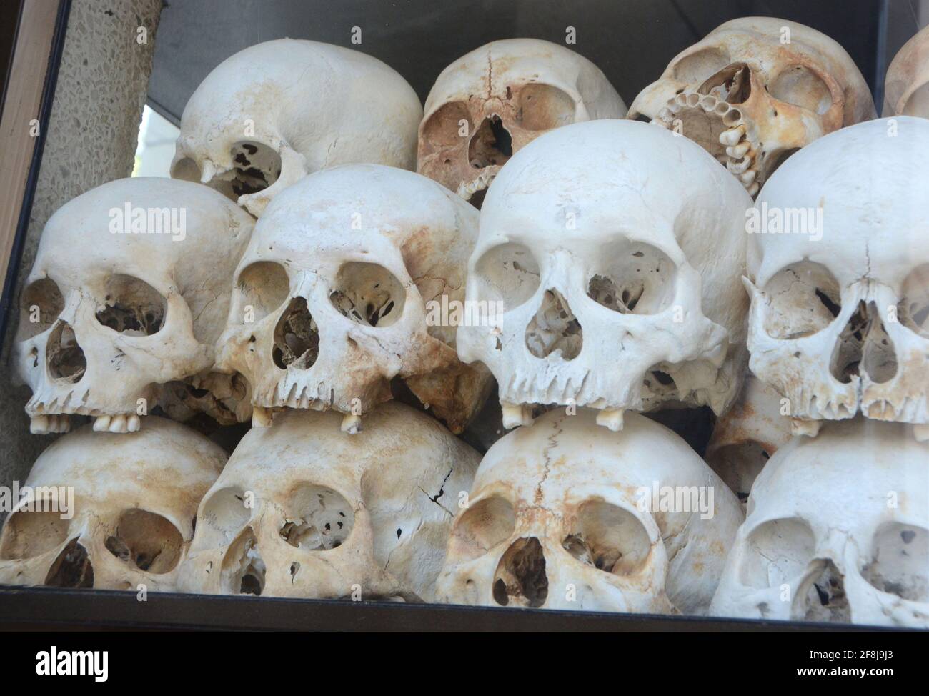 Phnom Penh, Cambodia. 12th Feb, 2017. Vice Media has admitted to digitally altering photos, like these, of prisoners held by the Khmer Rouge at the infamous Tuol Sleng or S-21 prison in Phnom Penh, Cambodia. Some of the photos were colorized by Vice and edited to show victims smiling. Remains of some victims of the 'Killing Fields'' are shown Tuesday, February 13, 2017 at a site near the capital city. Credit: Mark Hertzberg/ZUMA Wire/Alamy Live News Stock Photo