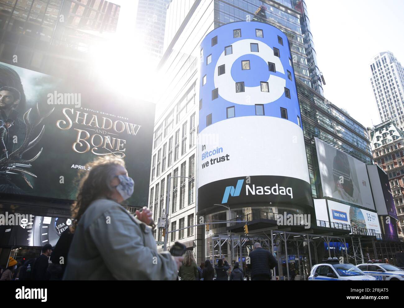 New York, United States. 14th Apr, 2021. The Coinbase logo is displayed on  screens in Times Square when Coinbase Global, Inc. beings trading under the  symbol COIN at the Nasdaq Opening Bell