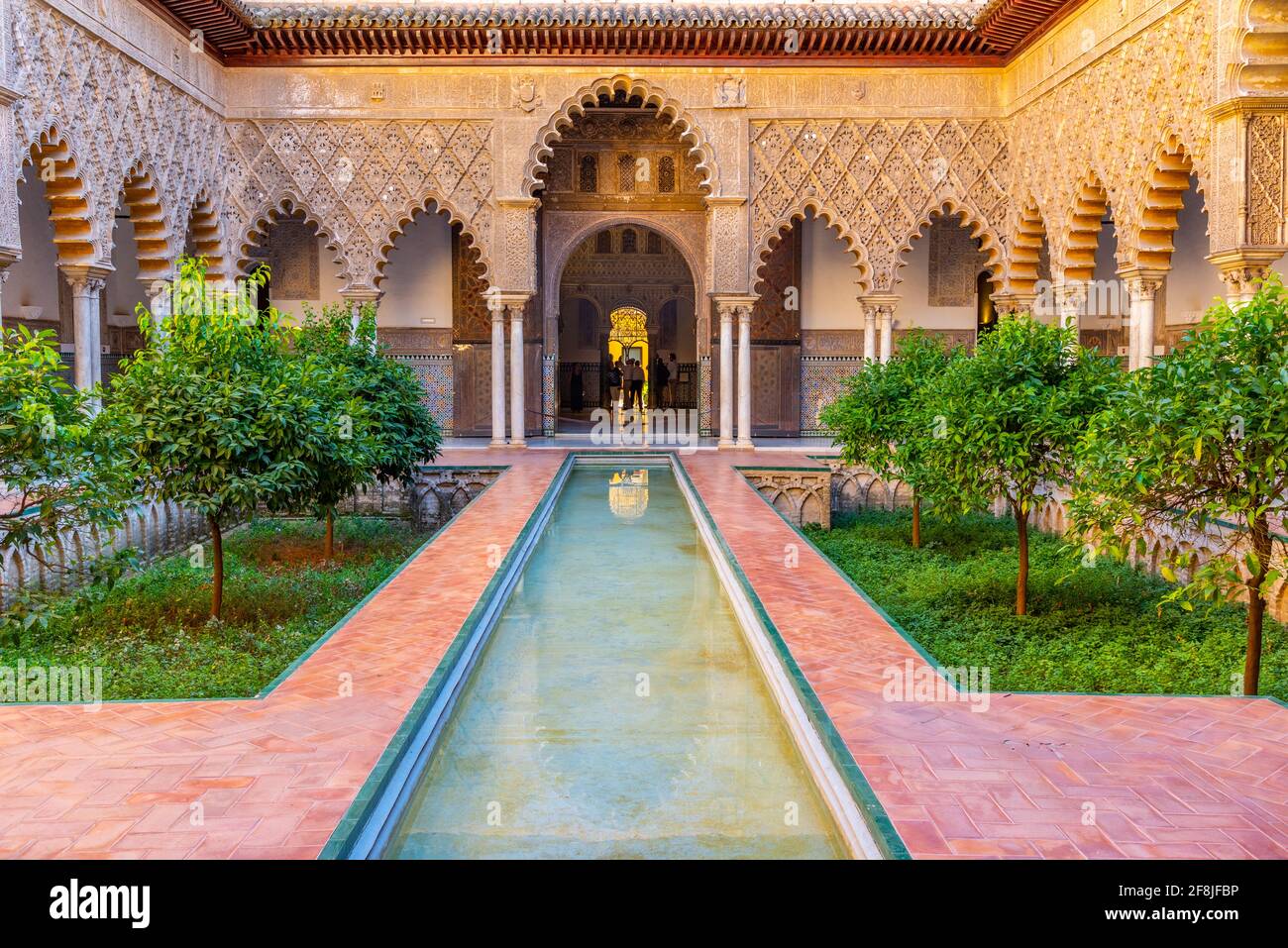 SEVILLA, SPAIN, JUNE 25, 2019: Patio de las Doncellas inside of the Mudejar palace at real alcazar de Sevilla in Spain Stock Photo