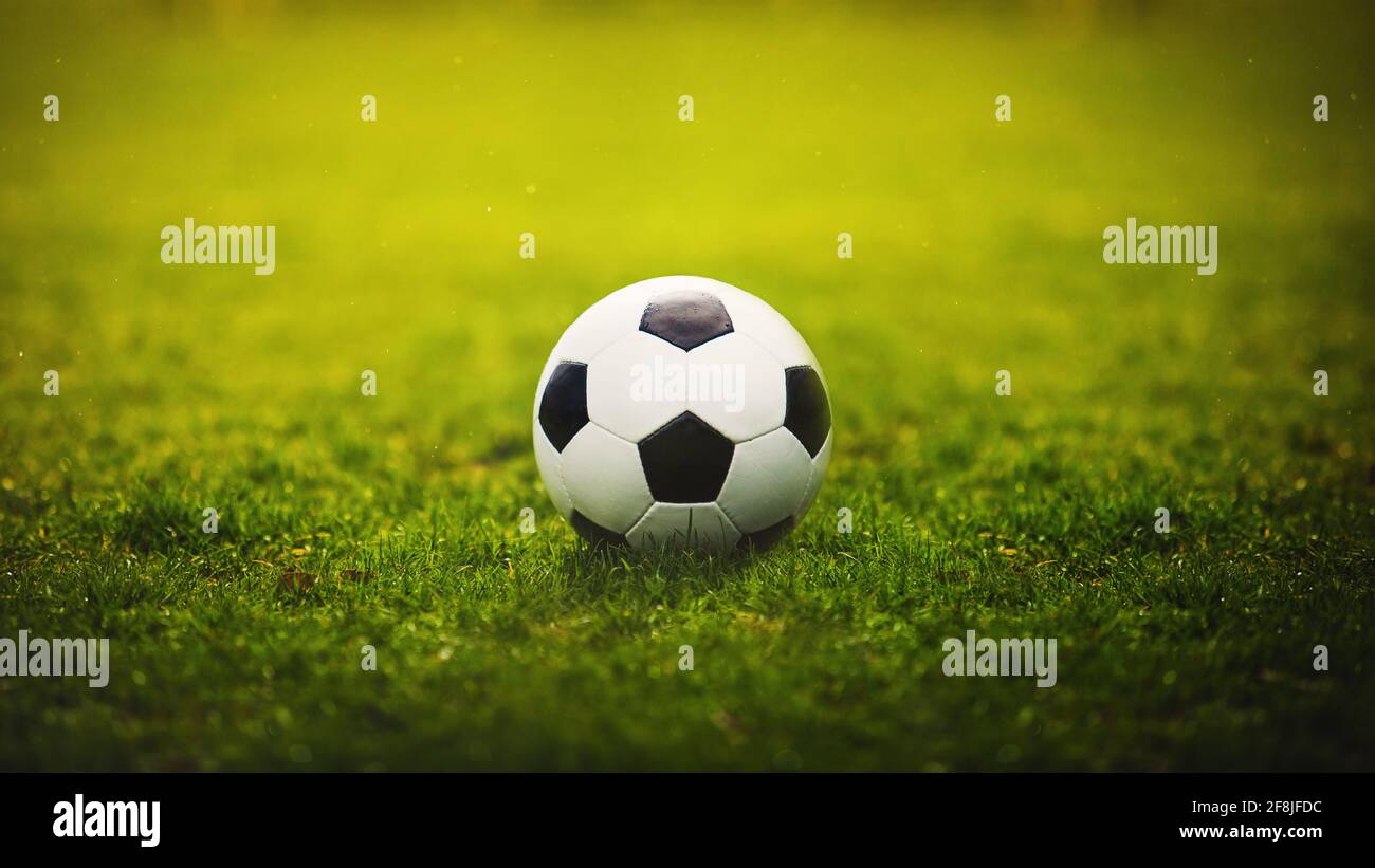 Classic soccer ball, typical black and white hexagon pattern, placed on