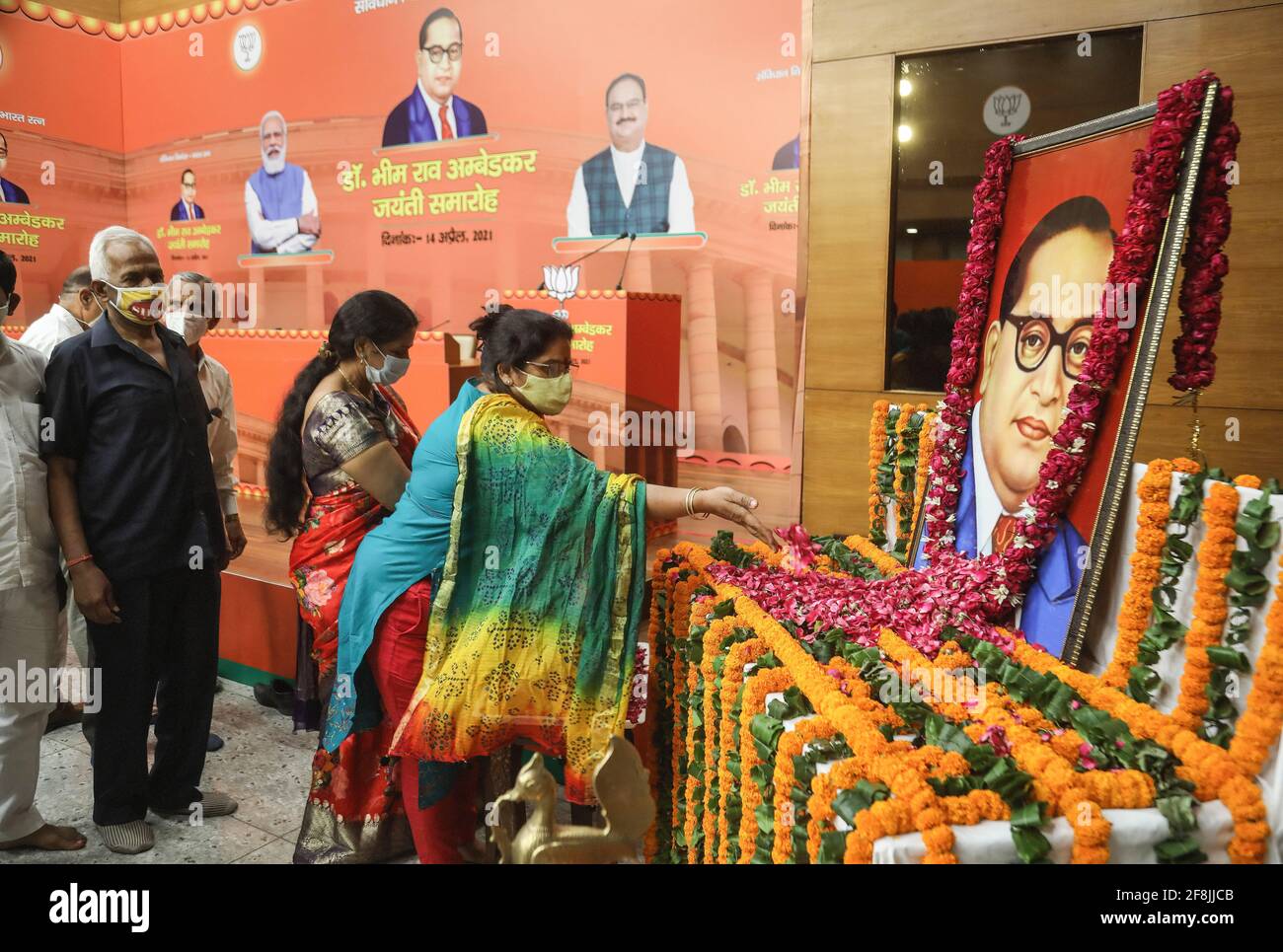 People pay floral tributes to the portrait of Bharat Ratna Baba Sahab ...