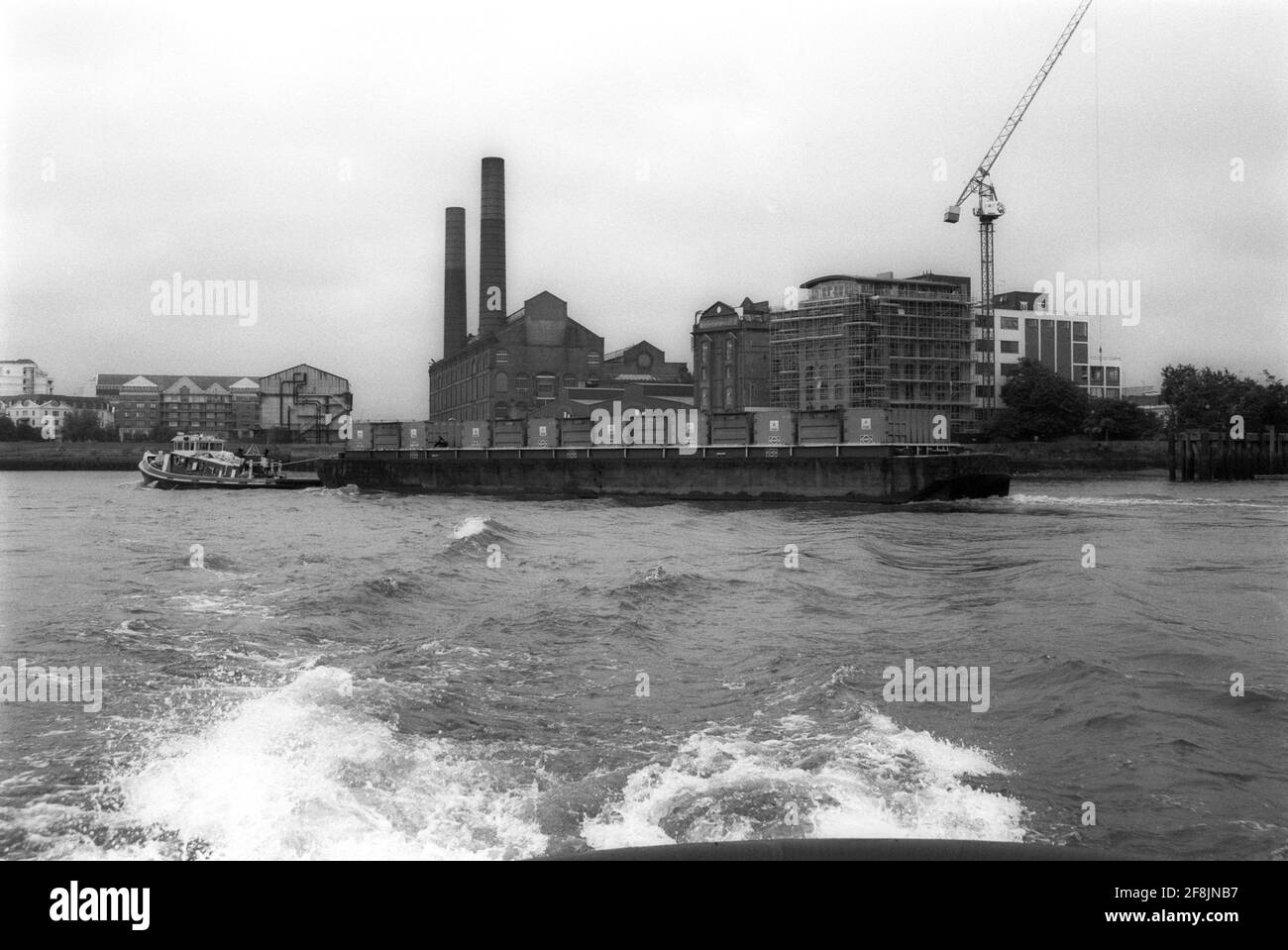 Lightermen of the River Thames working on the barges near to Battersea ...