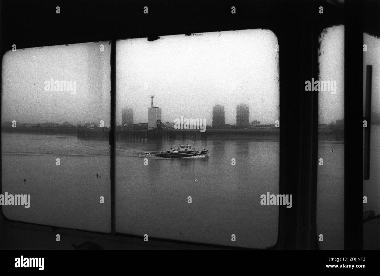 Woolwich Ferry London view of foggy London morning from captains cabin window Stock Photo