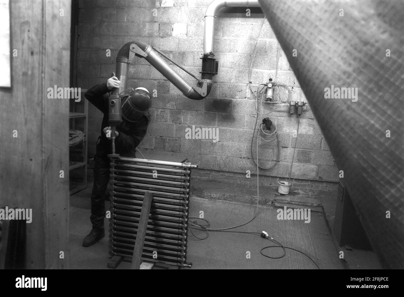 Sandblasting Radiators Abrasive blasting hi-res stock photography and images - Alamy