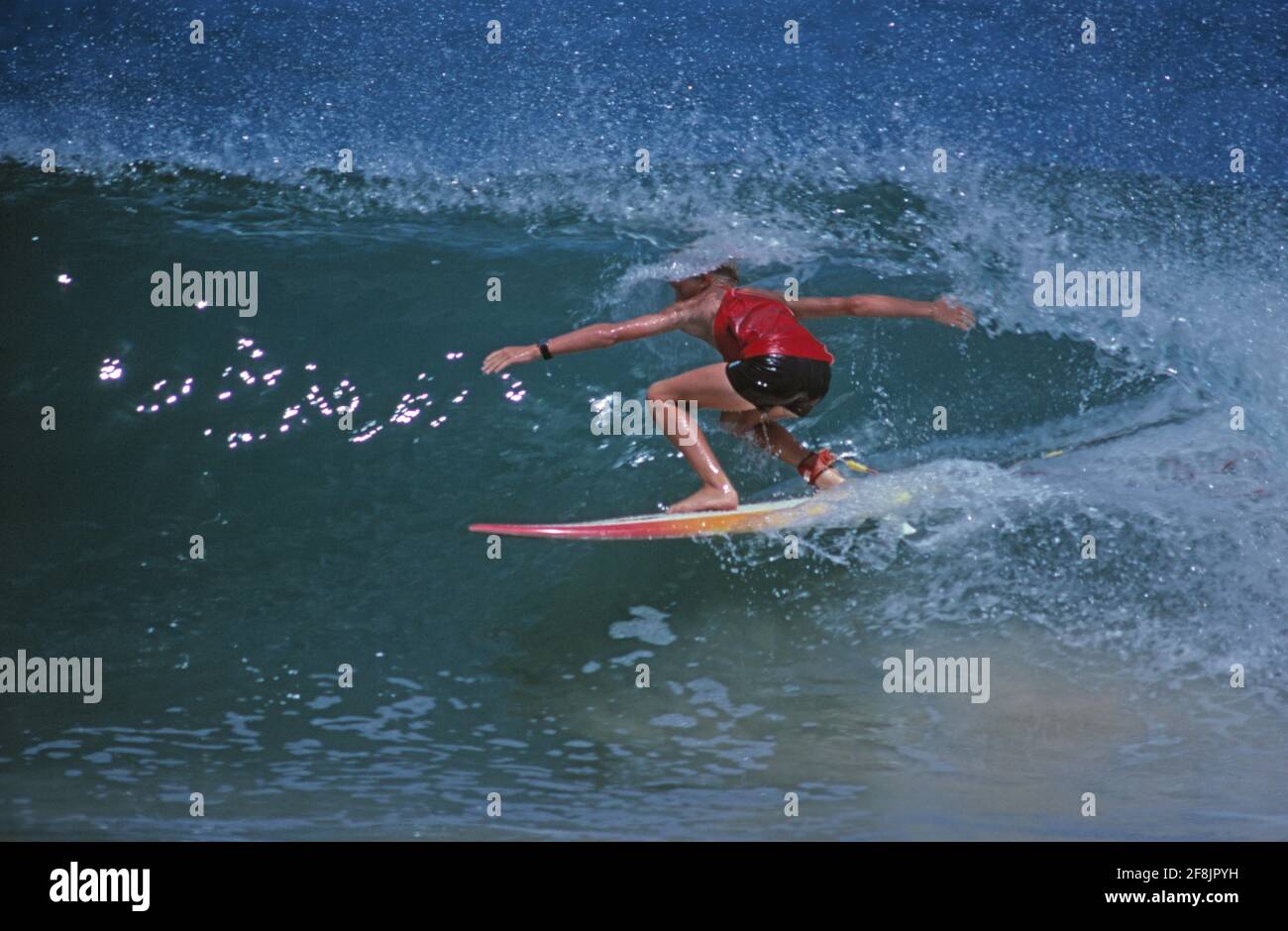 Surfing. Surfer in tube wave. Stock Photo