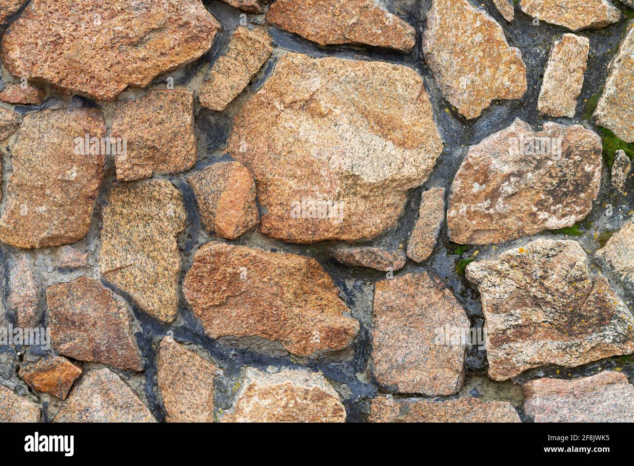 Background of natural old textured rough stone wall Stock Photo - Alamy