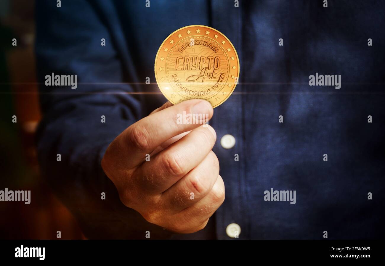 NFT Crypto art golden coin in hand abstract concept Stock Photo - Alamy